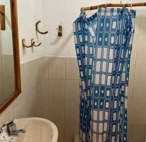 تختخواب و صبحانه Karukera