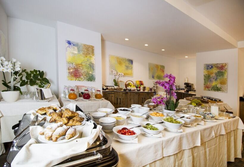 فندق Garni Caminetto