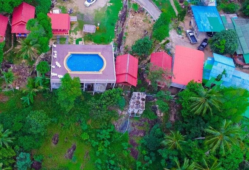 بنسيون J.b. Hut Bungalows