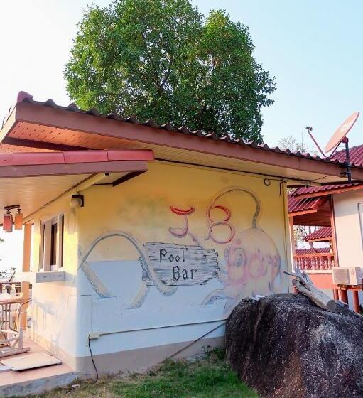 بنسيون J.b. Hut Bungalows