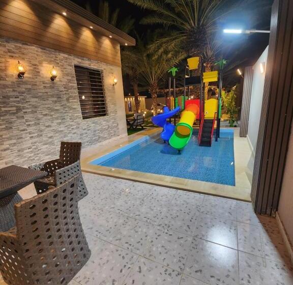 شاليه ومنتجع النخيل الريفي