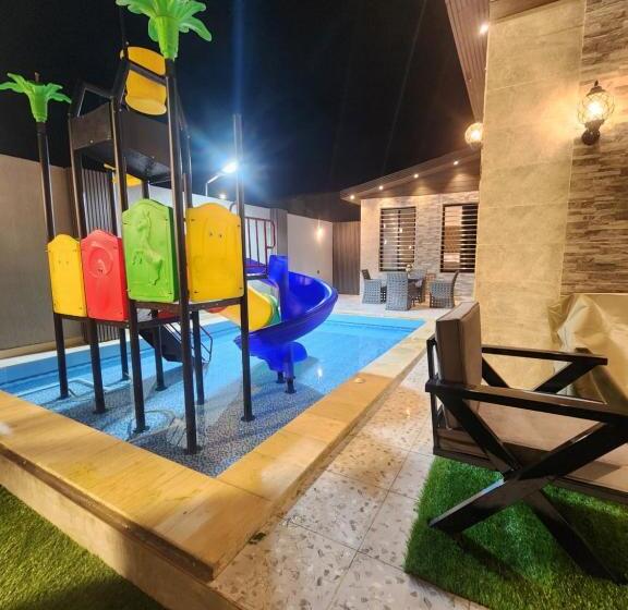 شاليه ومنتجع النخيل الريفي