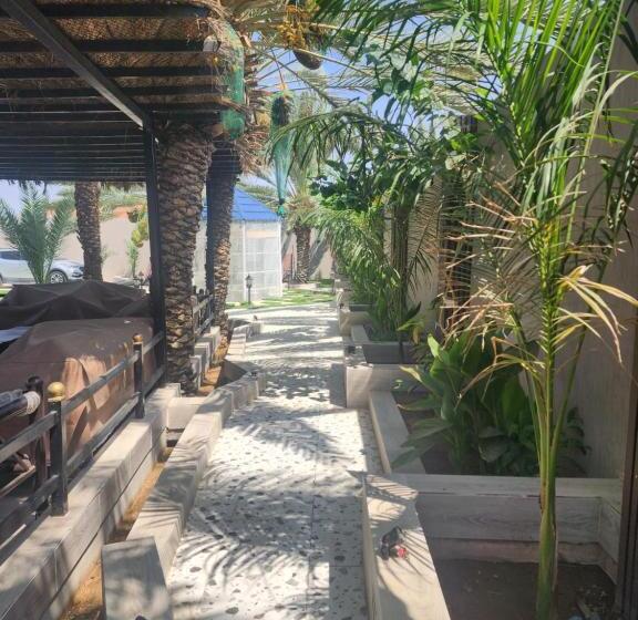 شاليه ومنتجع النخيل الريفي