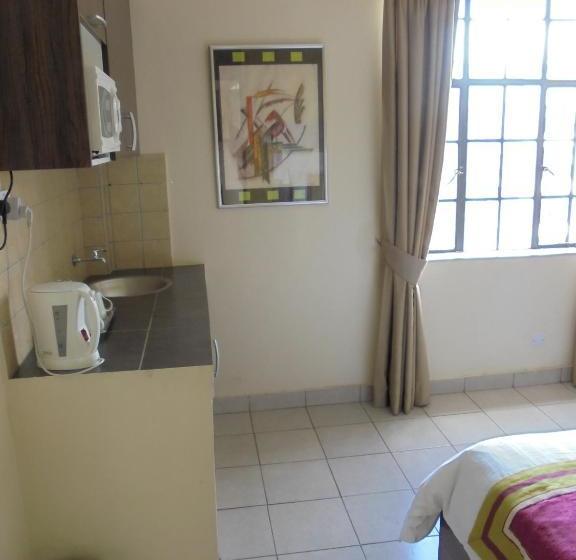 هتل Magharibi Suites