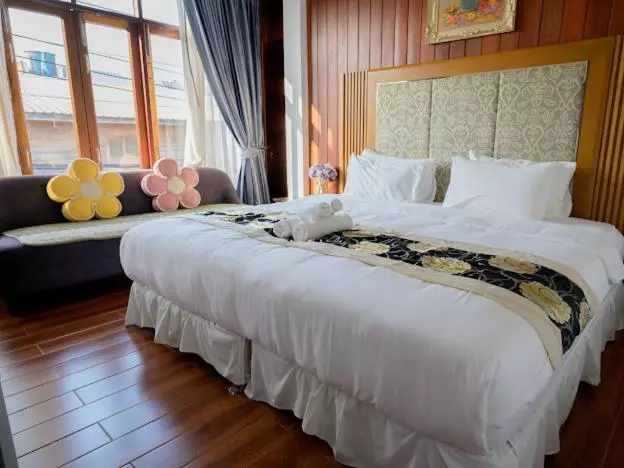 Hotelli โมเมนต์ แอ๊ท ริมโขง