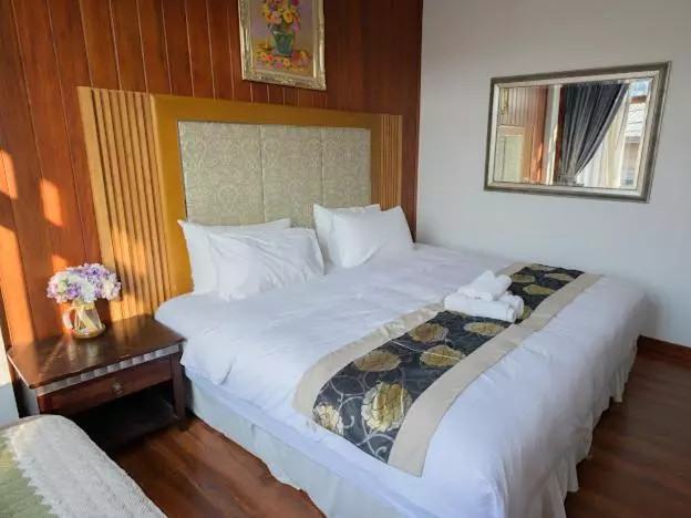 Hotelli โมเมนต์ แอ๊ท ริมโขง