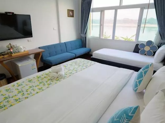 Hotelli โมเมนต์ แอ๊ท ริมโขง