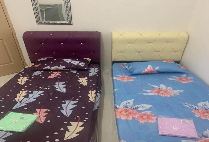 Otel Oyo 90966 Family Homestay