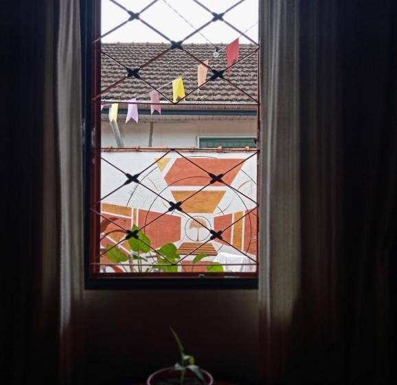 پانسیون Pueblos Hostel Latino