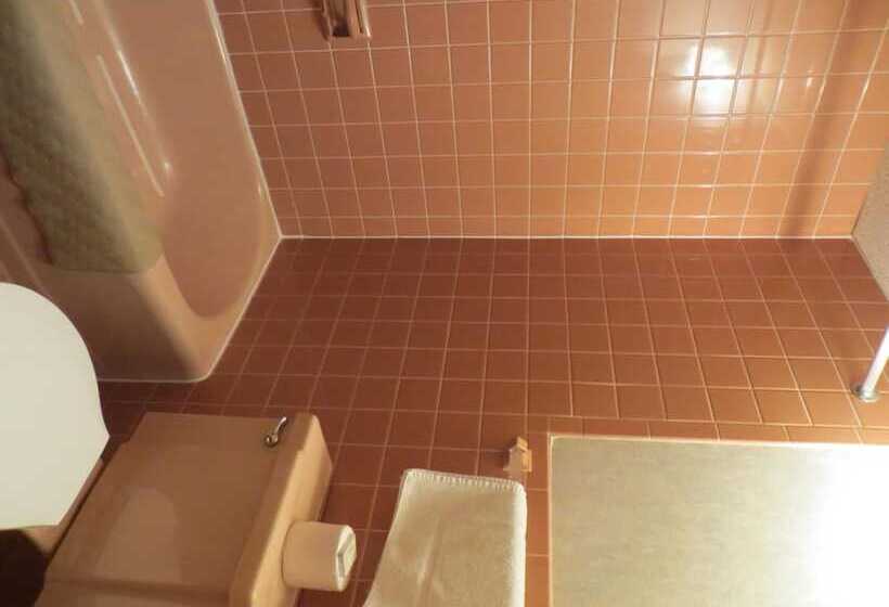 فندق على الطريق Mid Town Western Inn