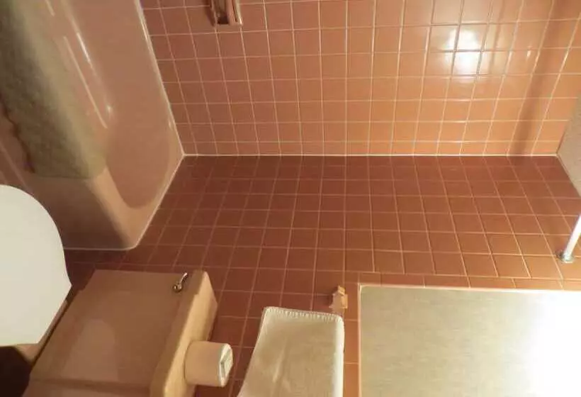 مُتل Mid Town Western Inn