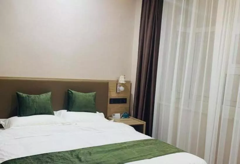 Hotelli Greentree Inn Express Xuzhou Pizhou Tiefu Town Bus Station