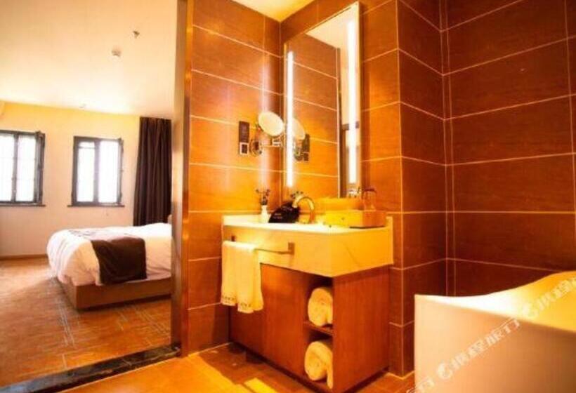 בית מלון כפרי James Joyce Coffetel Qingdao Oriental Cinema Chaoyangshan Metro Station