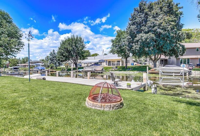 Oshkosh Canal Front Home W/ Sunroom & Watercraft!