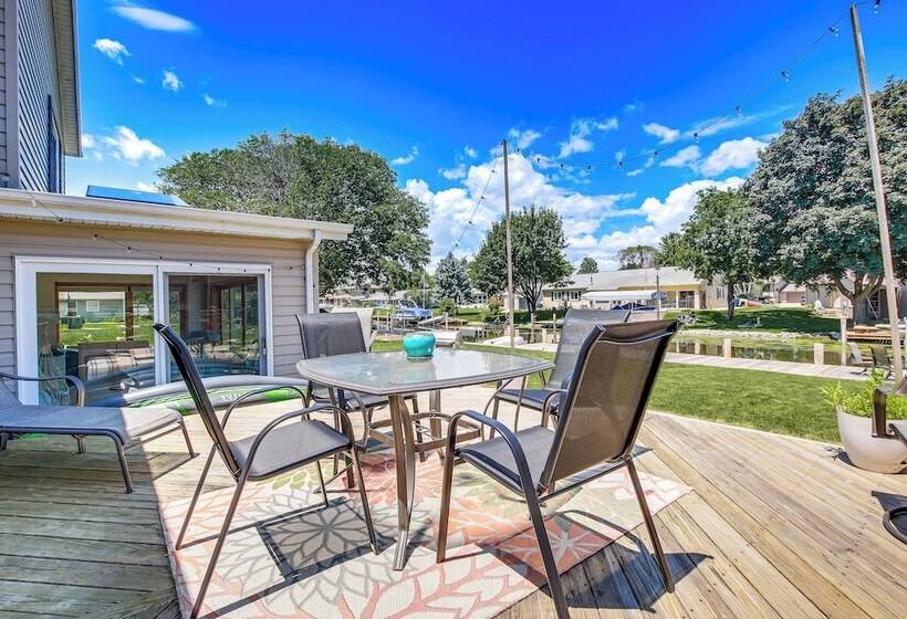 Oshkosh Canal Front Home W/ Sunroom & Watercraft!