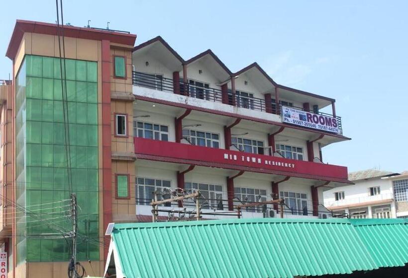 בית מלון כפרי Mid Town Residency