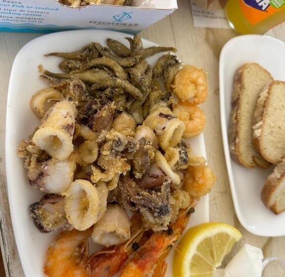 تختخواب و صبحانه Angolo Paradiso