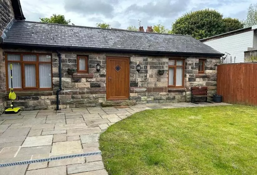 ペンション The Coachmans Cottage