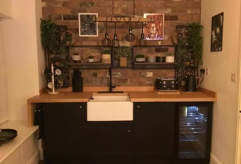 ペンション The Coachmans Cottage