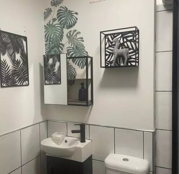 ペンション The Coachmans Cottage