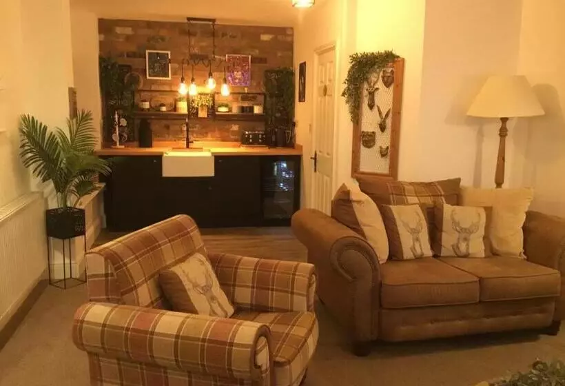 ペンション The Coachmans Cottage