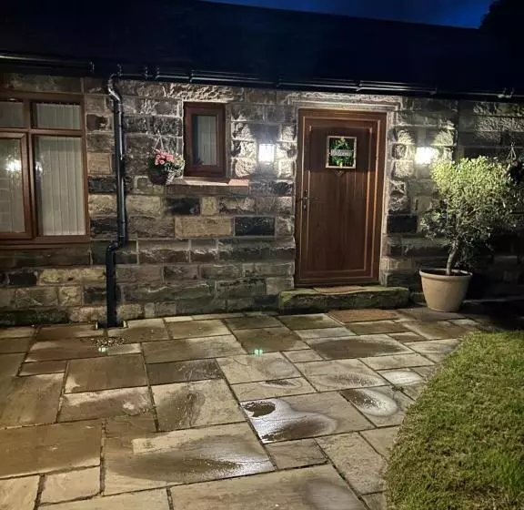 ペンション The Coachmans Cottage