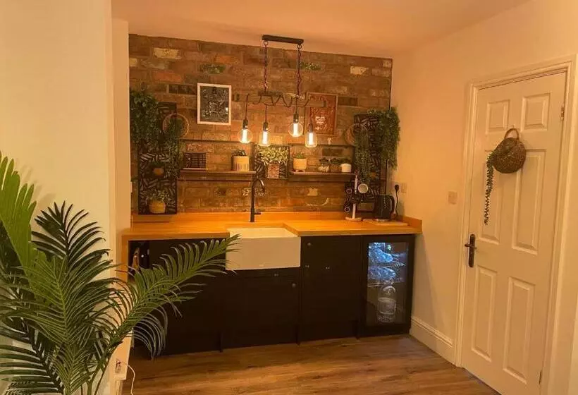 ペンション The Coachmans Cottage