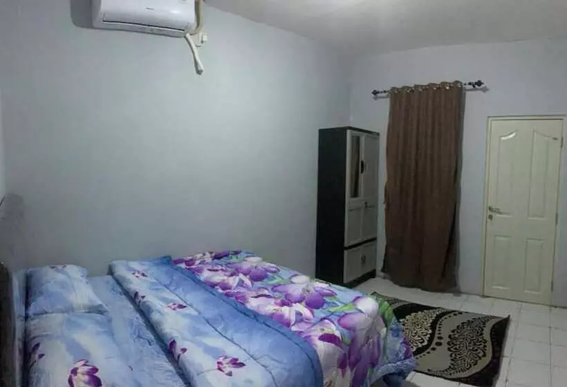 Hotelli Oyo 94098 Fgh Residence 1