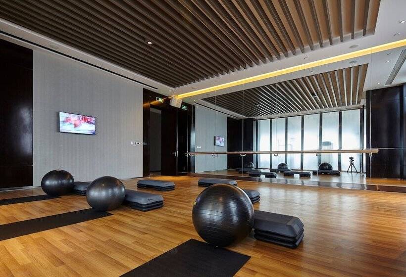 Отель Wanda Realm Dongying