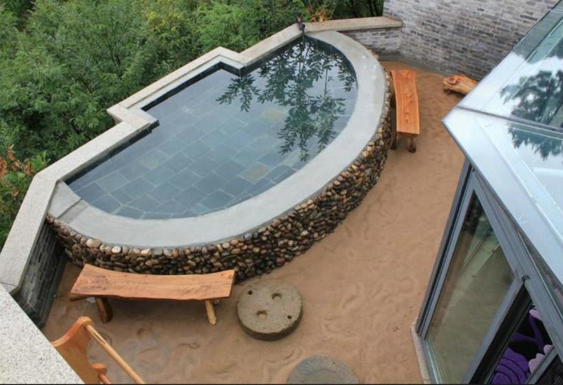 Отель Xin Shuang Quan Resort