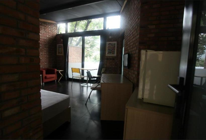 Отель Xin Shuang Quan Resort