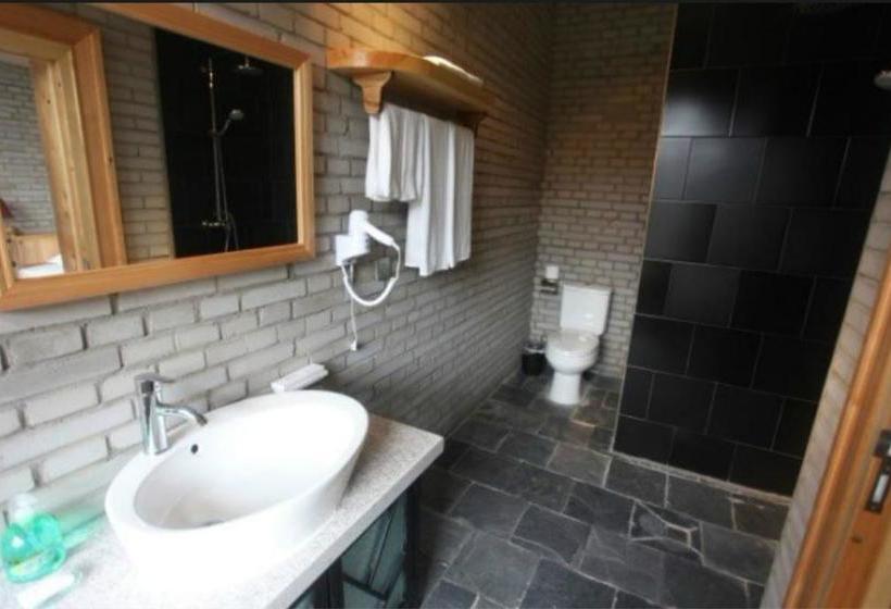 Отель Xin Shuang Quan Resort