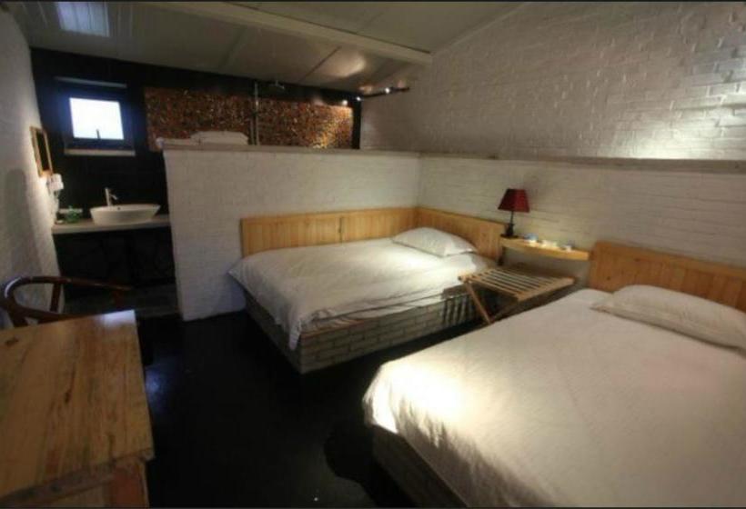 Отель Xin Shuang Quan Resort