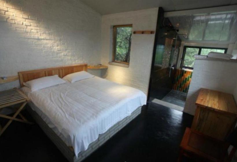 Отель Xin Shuang Quan Resort