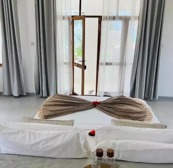 Hotelli Mnana Beach Bungalows