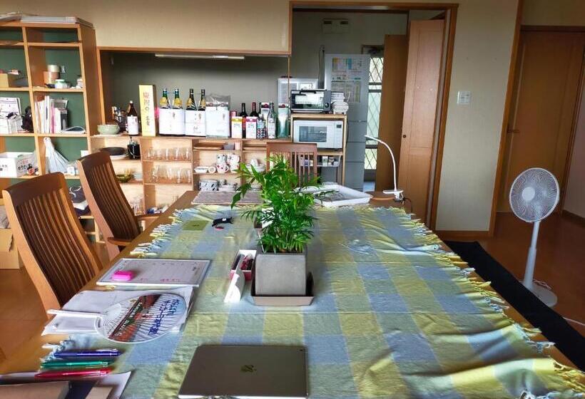 پانسیون 奄美ゲストハウス宇宿サンライズビーチ