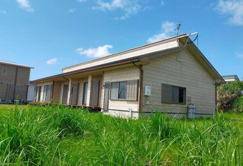 پانسیون 奄美ゲストハウス宇宿サンライズビーチ