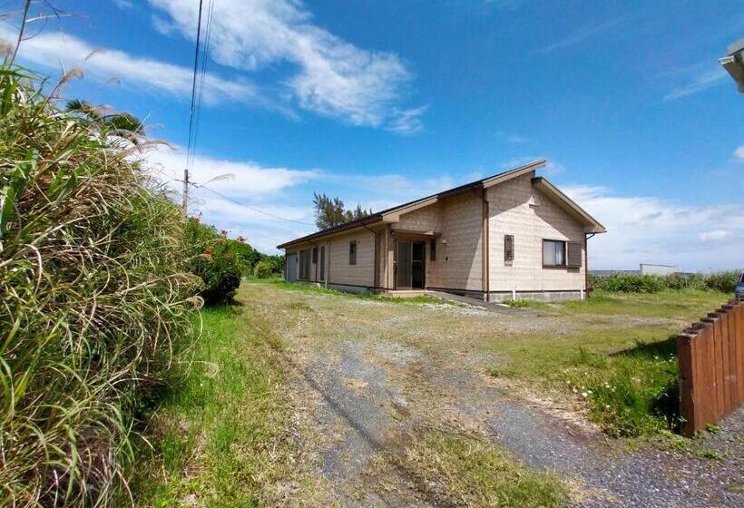 پانسیون 奄美ゲストハウス宇宿サンライズビーチ