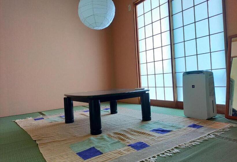 پانسیون 奄美ゲストハウス宇宿サンライズビーチ