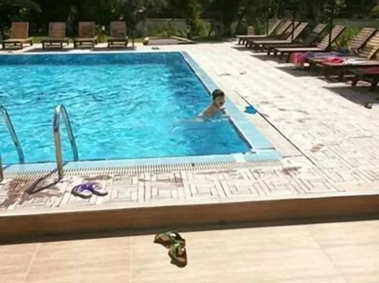 Hotelli The Green Beach Resort