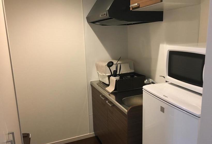 בית מלון כפרי Resort Class Inn Onna Village