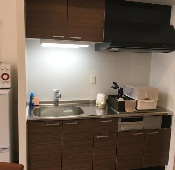 בית מלון כפרי Resort Class Inn Onna Village