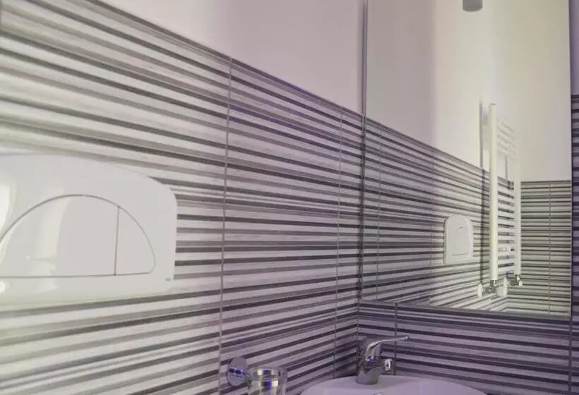 تختخواب و صبحانه Iris Inn