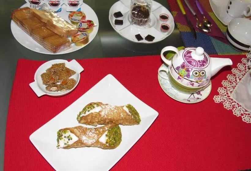 تختخواب و صبحانه La Voce Del Violino