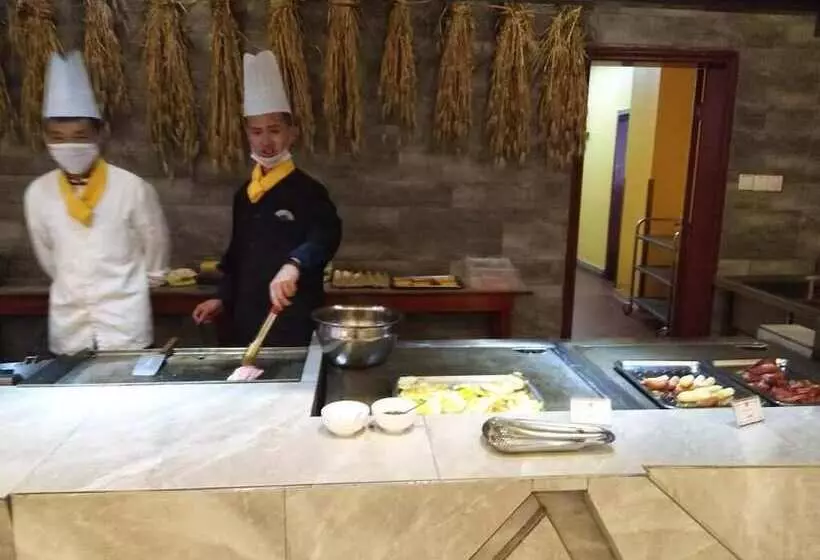 Hotelli Ramada Encore Daochengyading