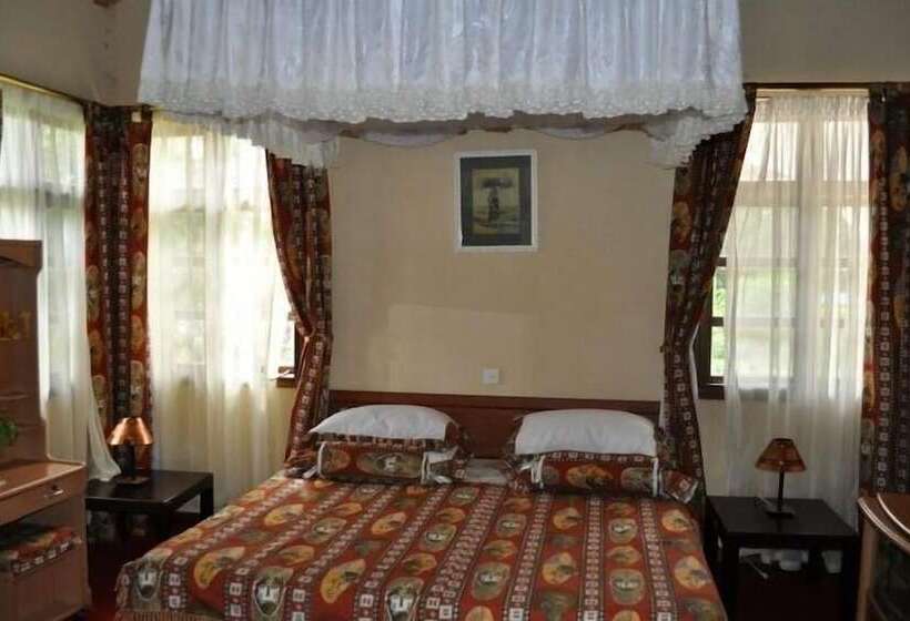 Отель Ngurdoto Mountain Lodge