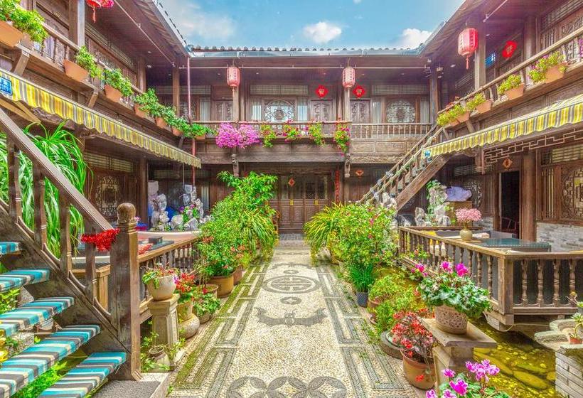 Отель Lijiang He Mu Ju Family Inn