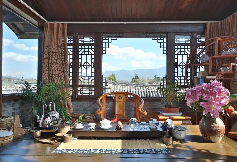 Отель Lijiang He Mu Ju Family Inn