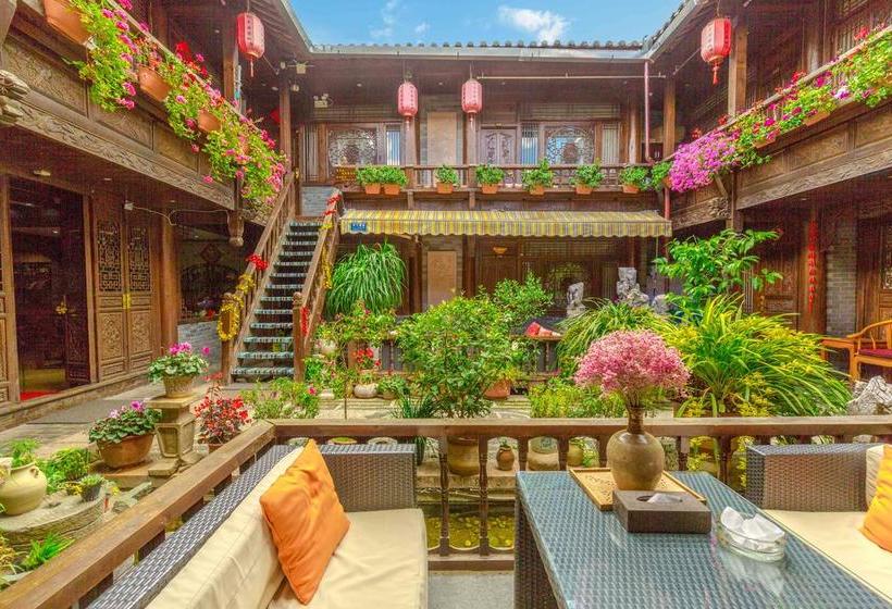 Отель Lijiang He Mu Ju Family Inn