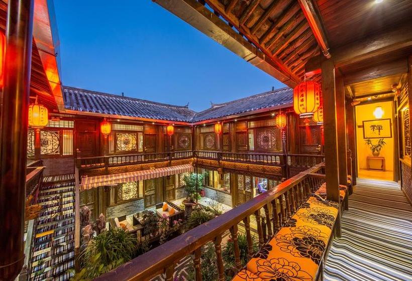 Отель Lijiang He Mu Ju Family Inn